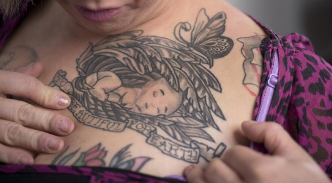 One of Michelle Knight's in memoriam tattoos (Photo: Dustin Franz for Newsweek)